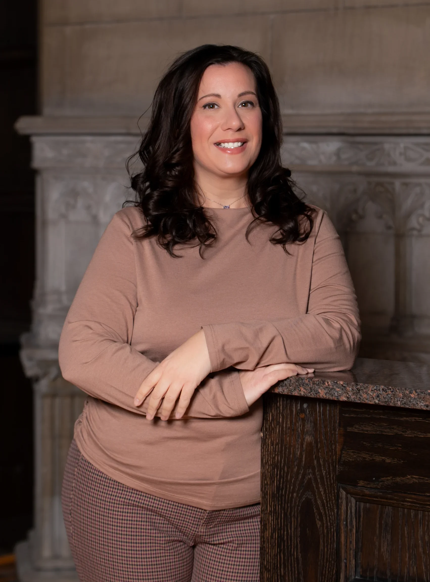 Amanda Ruggiero Full Headshot on Marble