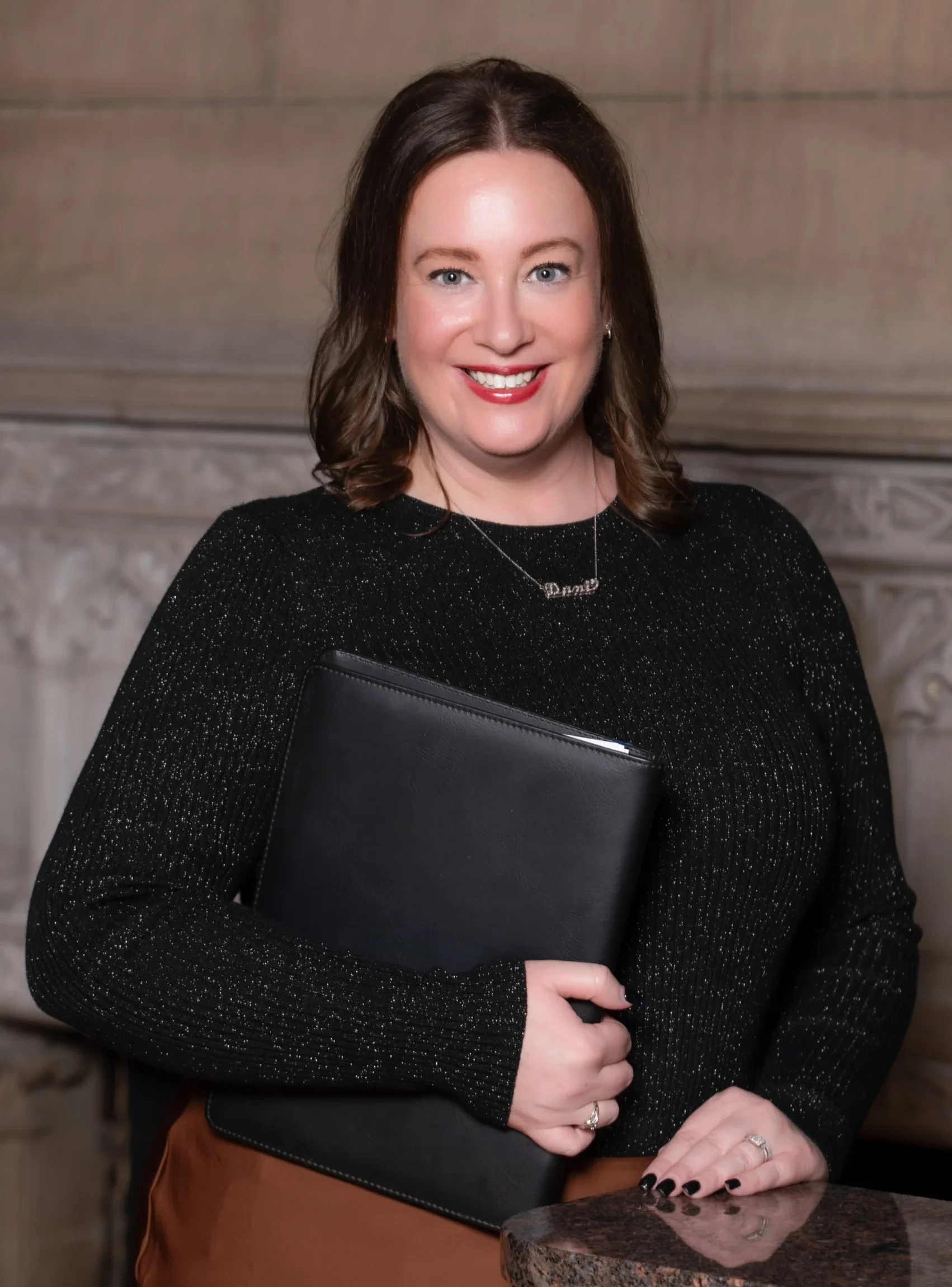 Dani Maloney Headshot on Marble