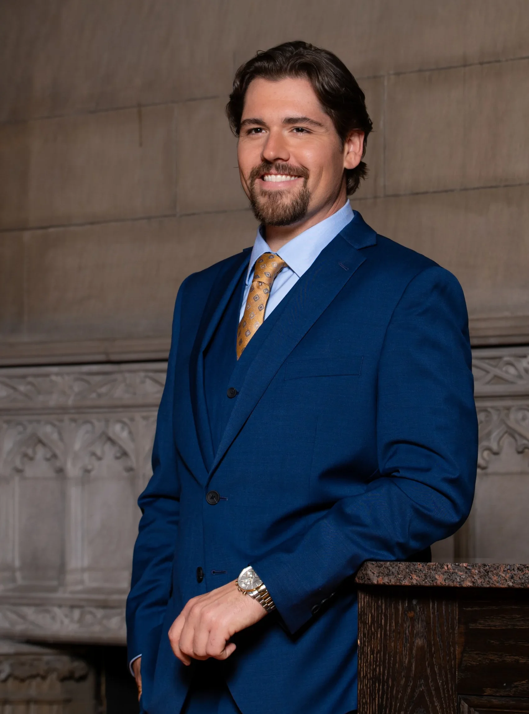 George J. Badey IV Full Headshot on Marble