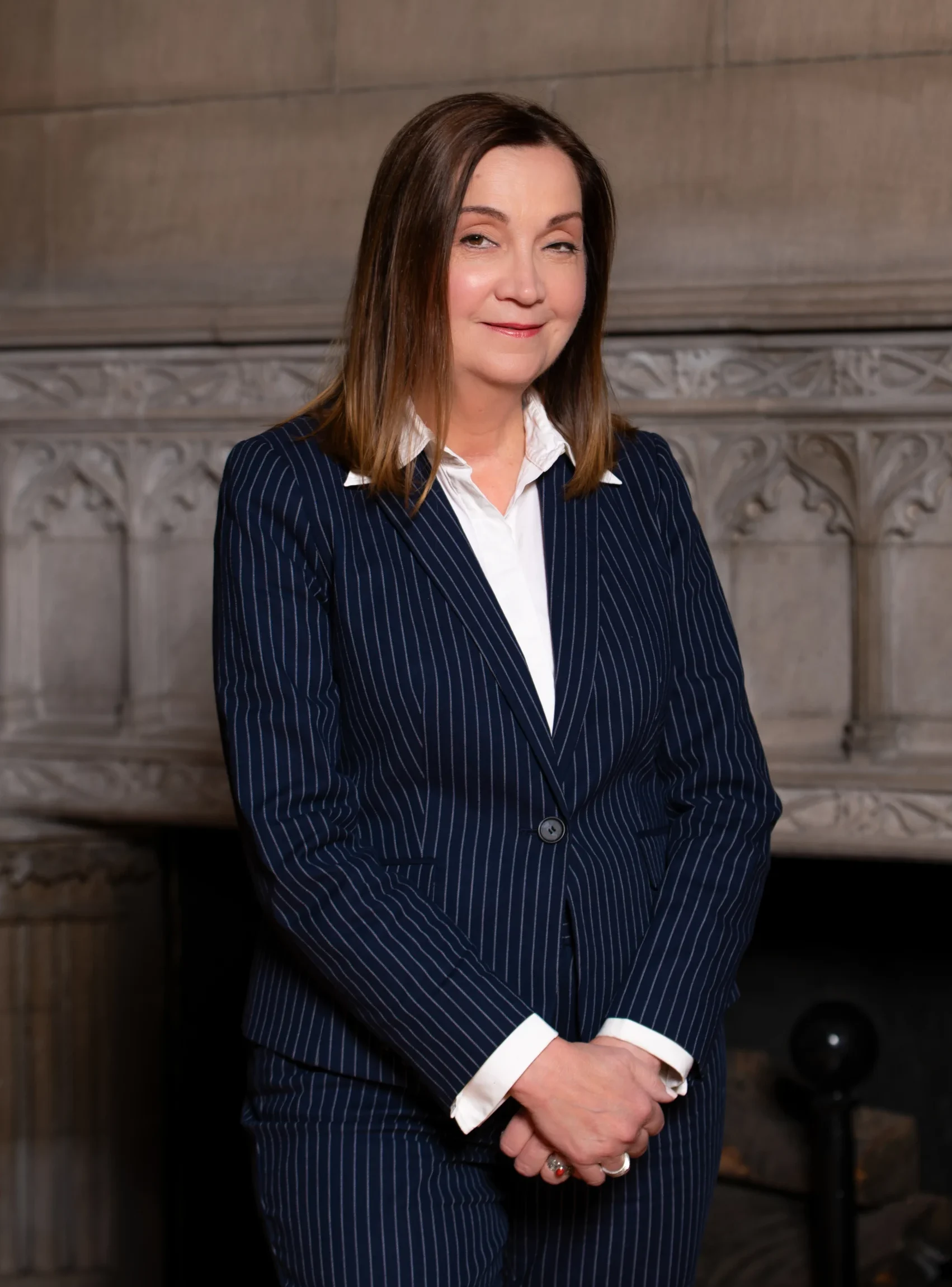 Susan J. Herczeg Full Headshot on Marble